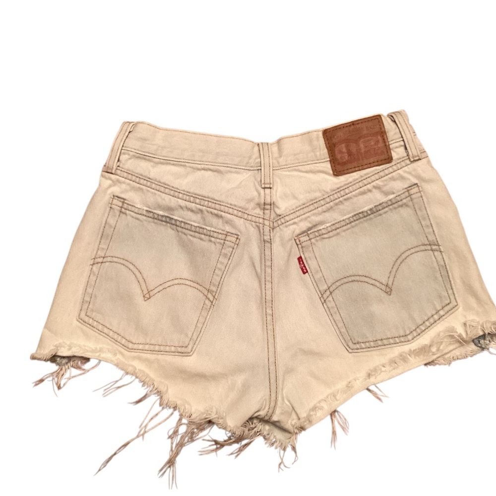 Vintage Authentic Levi’s cut off short shorts in bleached light color denim